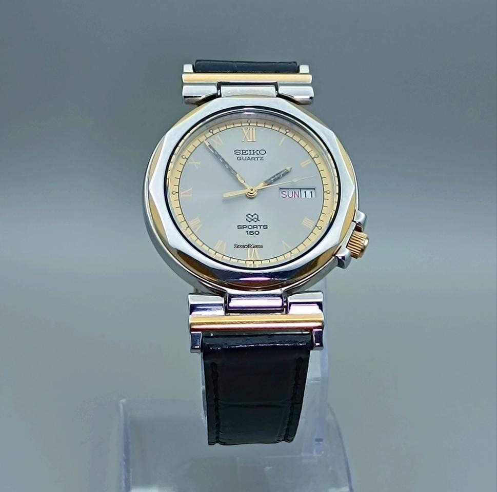 Seiko SQ Sports 100 5H23-8A20 April 1986 Two Tone Art Deco Lugs Gold Steel Japan